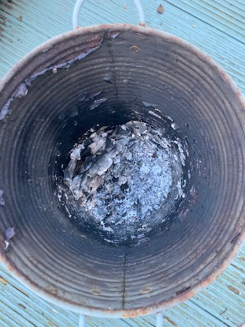 Fire pit image Sarah made from an old metal pot to burn off the paperwork associated with the cancer