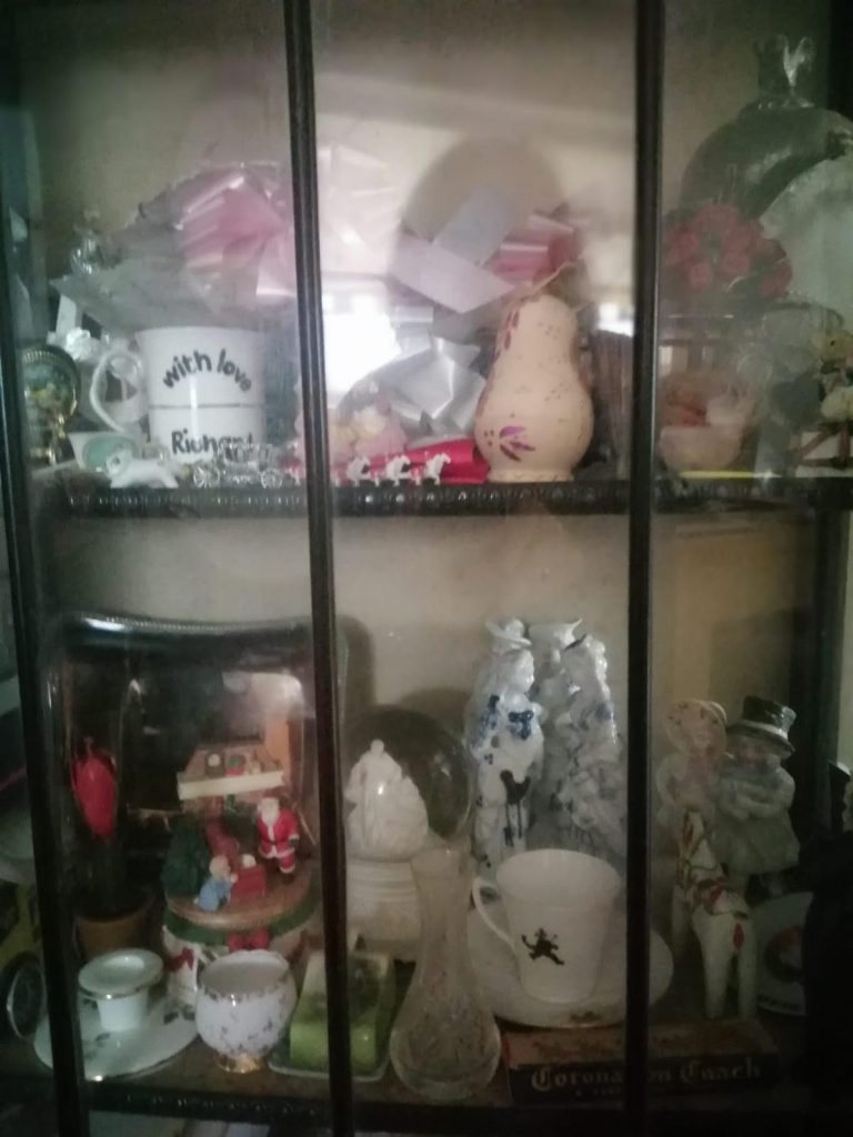 Mother's elegant china cabinet is a good place to start to cure a habit of hoarding